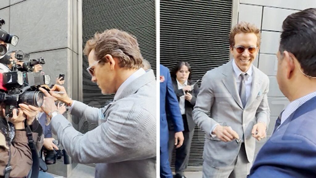 Ryan Reynolds Pretends to Sign Paparazzi Cameras at ‘Another Simple Favor’ Event