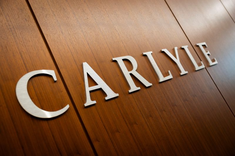 Carlyle allays software fears, private-equity deals boost profit